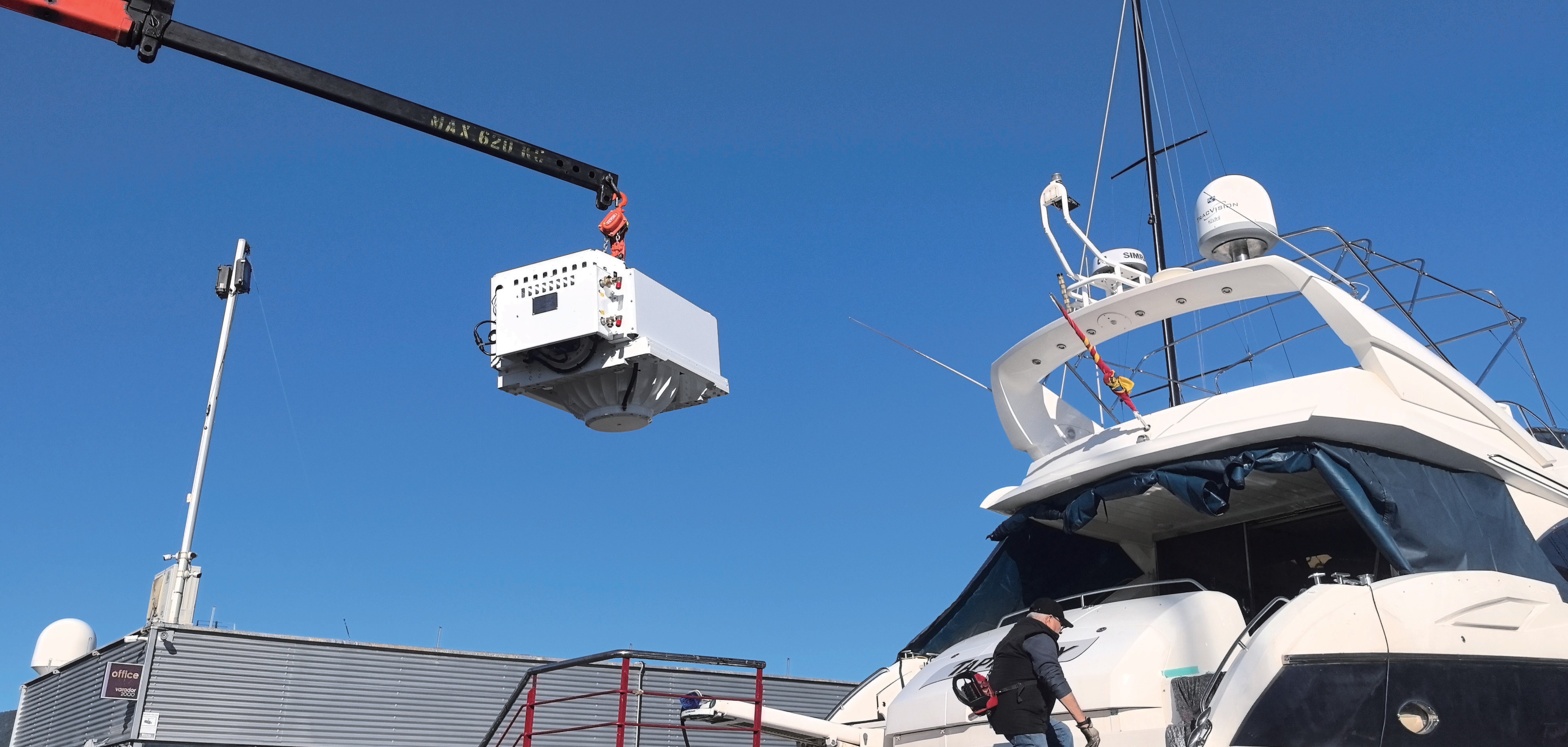 ZGYRO stabilizer being craned aboard a flybridge yacht