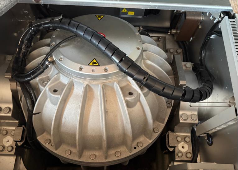Close-up of a ZGYRO flywheel housing inside an installed unit